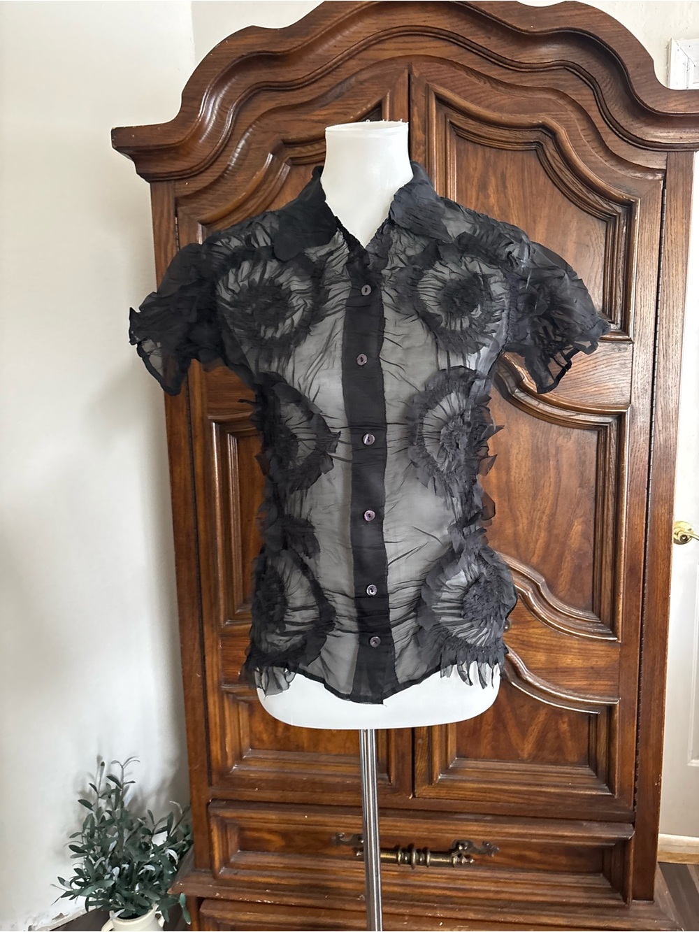Cache Black sheer blouse with ruffled floral appliqués